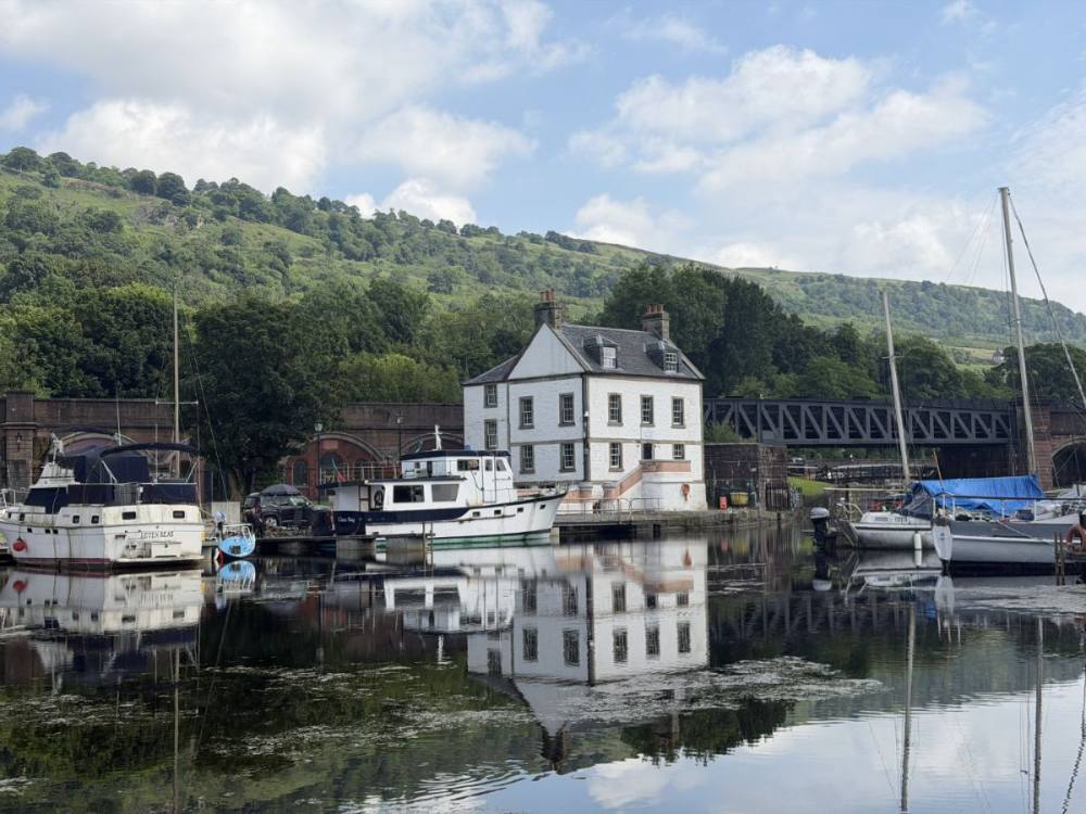 The Customs House and the conserved railway viaduct at Bowling Basin